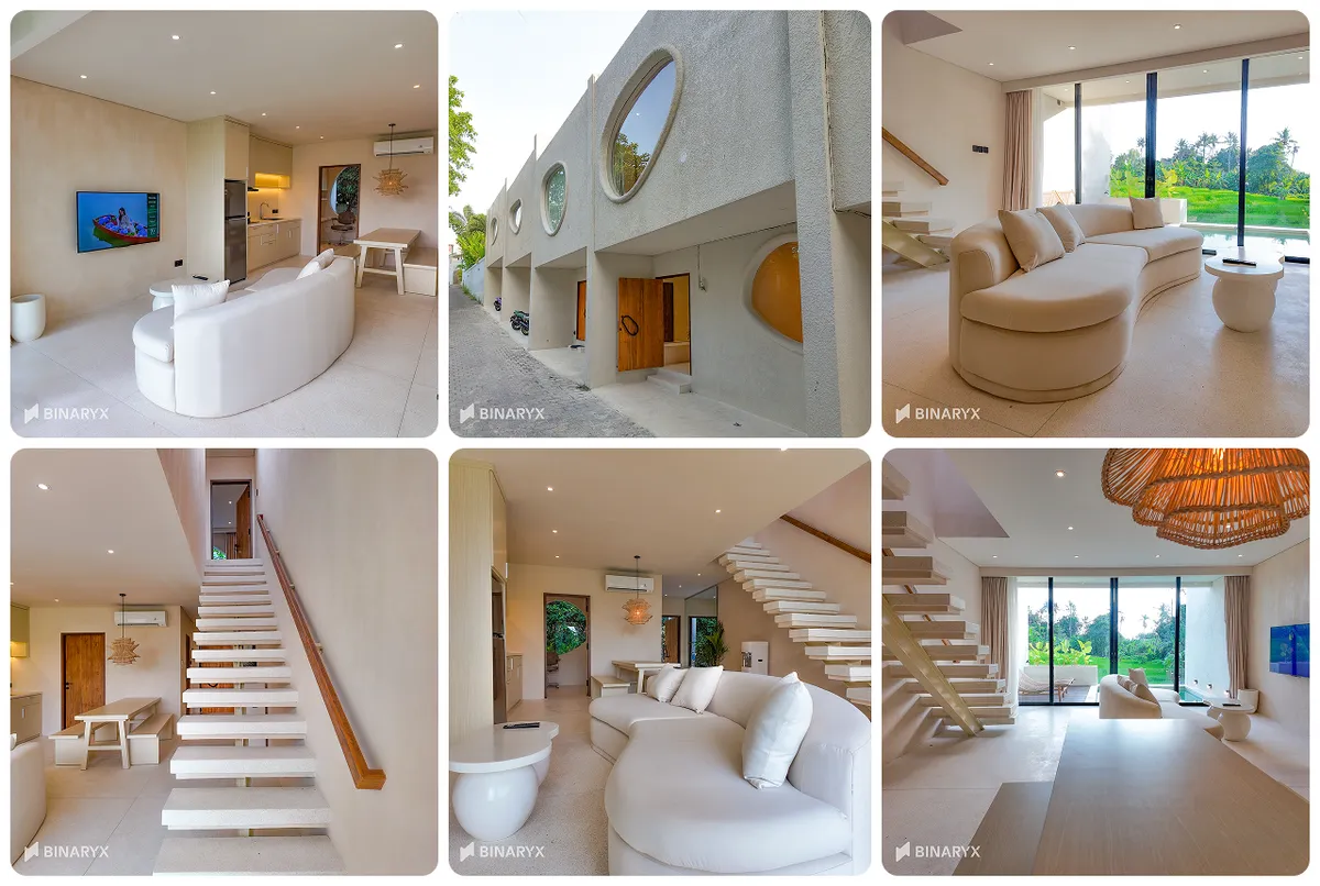 Intérieur d'une villa Bubbles : salon ouvert avec cuisine équipée et baies vitrées